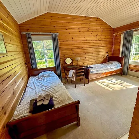 Villa Mustikka - Modern Log On A Waterfront Estate Långstrand